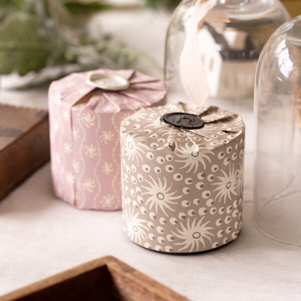 scented candles with pretty gift wrap